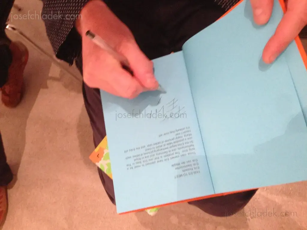 Erik Kessels signing "Tables to Meet" with "For Erik" (3)