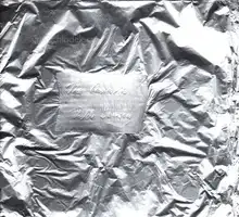 hand-wrapped in aluminum foil with handwritten label